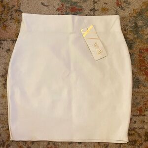 Stretchy white mini skirt